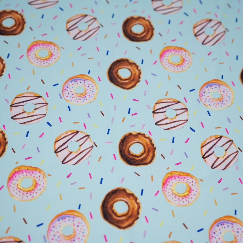 Dancing Doughnuts Printed Spandex Fabric | Blue Moon Fabrics