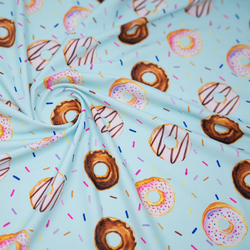 Dancing Doughnuts Printed Spandex Fabric | Blue Moon Fabrics