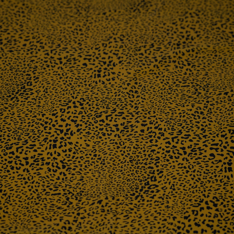 Finely Spotted Cheetah Printed Spandex Fabric | Blue Moon Fabrics