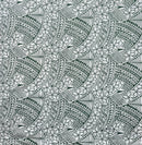 Pine Green hibiscus and traditional Polynesian tattoo print polycotton fabric