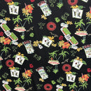 Jackpot on a Strip Hawaiian fabric print featuring Las Vegas casino signs, roulette wheels, playing cards, dice, and tropical palm trees on black background.