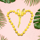 Yellow colored Kukui Nut Lei 