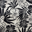 Black and white Hawaiian hibiscus floral and palm leaf print on 100% rayon fabric.