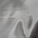 White 100% polyester bridal satin fabric by Islands Fabric for island wedding gowns, formal dresses, and ceremonial wear.