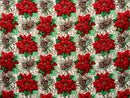 Festive holiday fabric pattern featuring red poinsettias, brown pinecones, and green holly leaves arranged in vertical rows over a background of green and white plaid and ornate gold swirls.