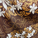 Decorative fabric with floral and swirl patterns in gold and white on a brown background