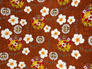 Rust Tonga Seal Hibiscus All Over Design Fabric 
