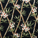 "Bamboo Branches with Flowers and Leaves Upholstery Fabric, 100% cotton floral print with bamboo motif on a black background."